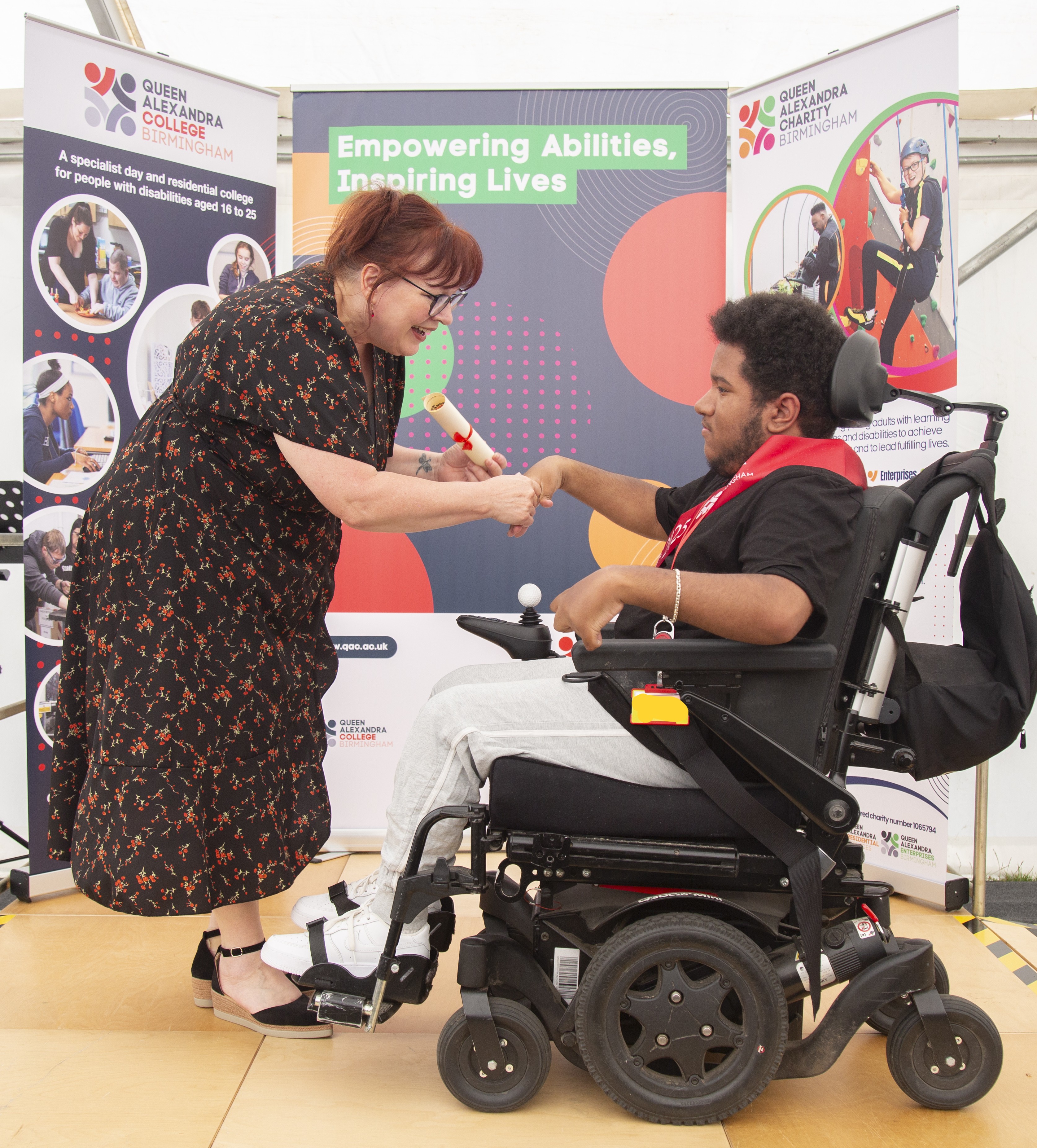 Bev Jessop, Principal and Chief Executive, presents an award to a student 