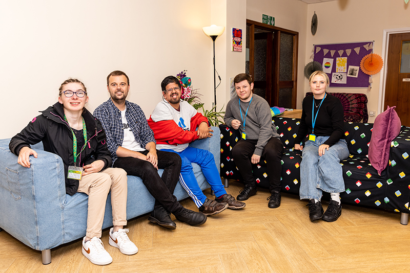 Staff and students talking