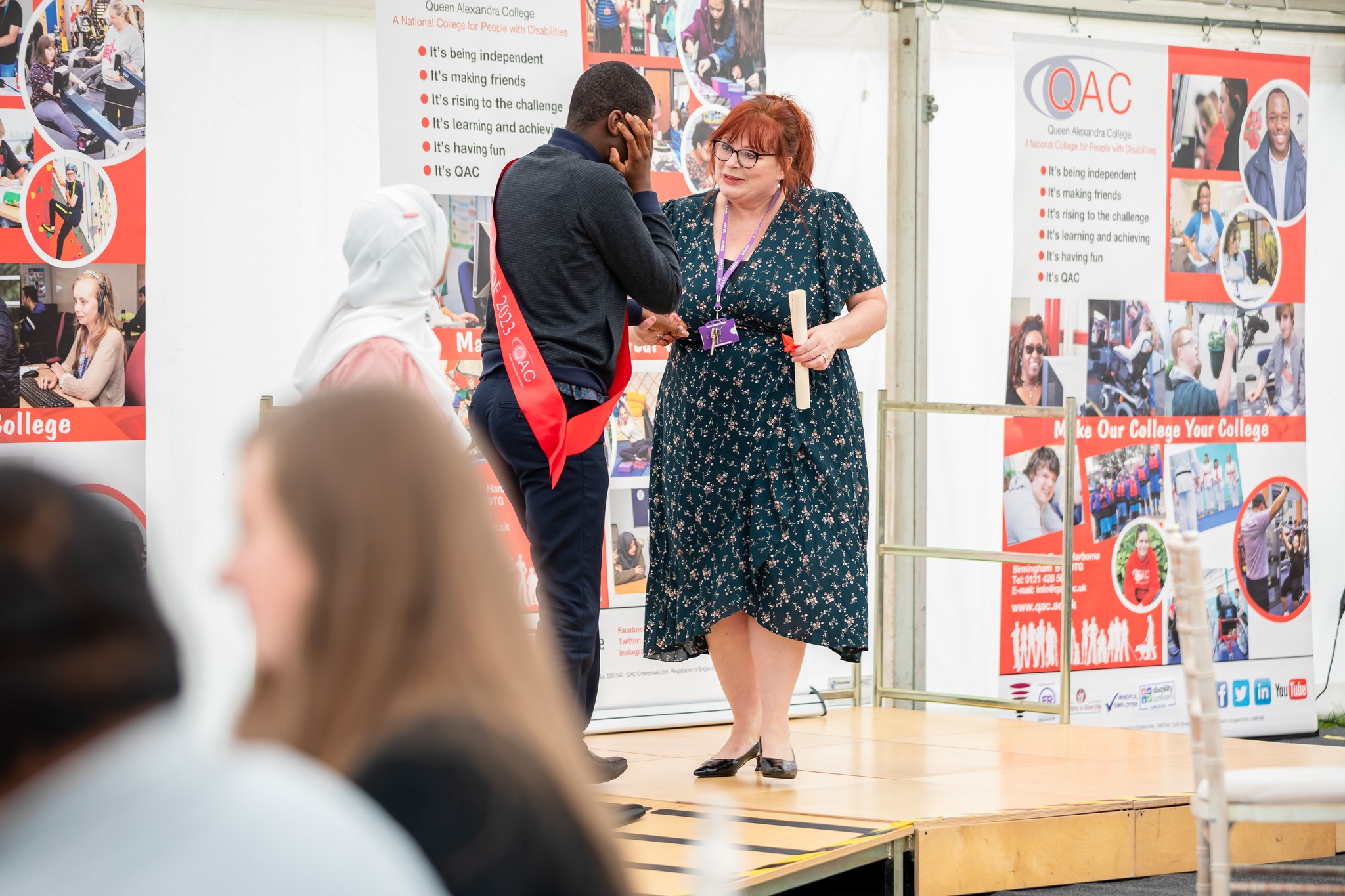 Bev Jessop, Principal and Chief Executive, presents an award to a student 
