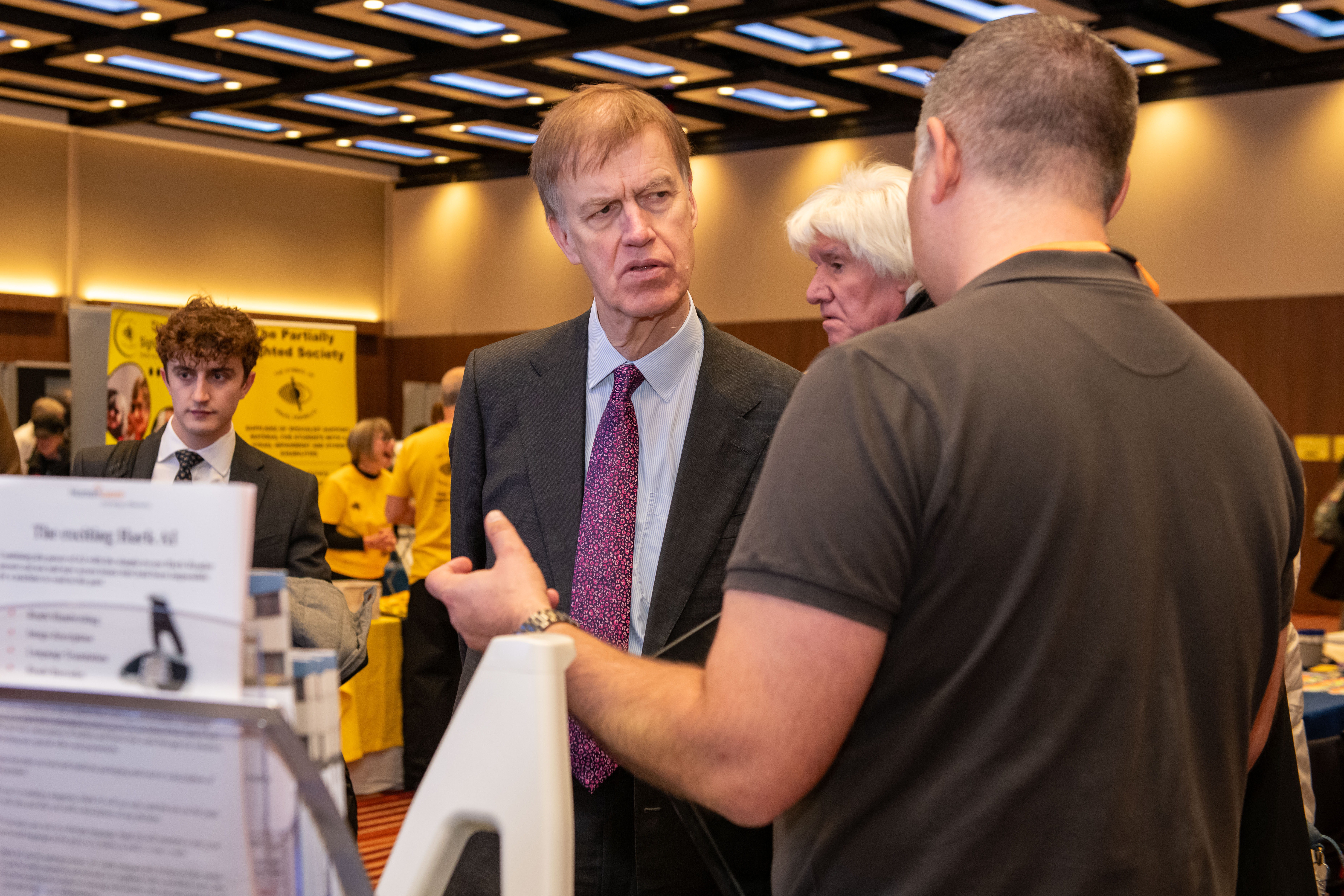 Image of Sir Stephen talking to an exhibitor Image of Sir Stephen talking to an exhibitor