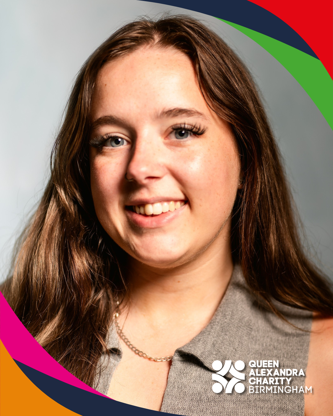 Close-up headshot of a person smiling at the camera, with a charity logo in the corner and colourful graphic shapes framing the image. Close-up headshot of a person smiling at the camera, with a charity logo in the corner and colourful graphic shapes framing the image.