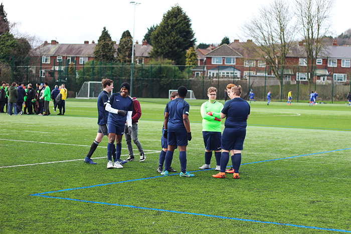 QAC Football Team in a pre match team talk QAC Football Team in a pre match team talk