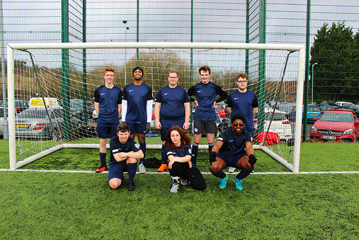 QAC Football Team posing for picture pre game in their new kit QAC Football Team posing for picture pre game in their new kit