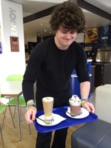 Jim serving drinks at Coffee Junction