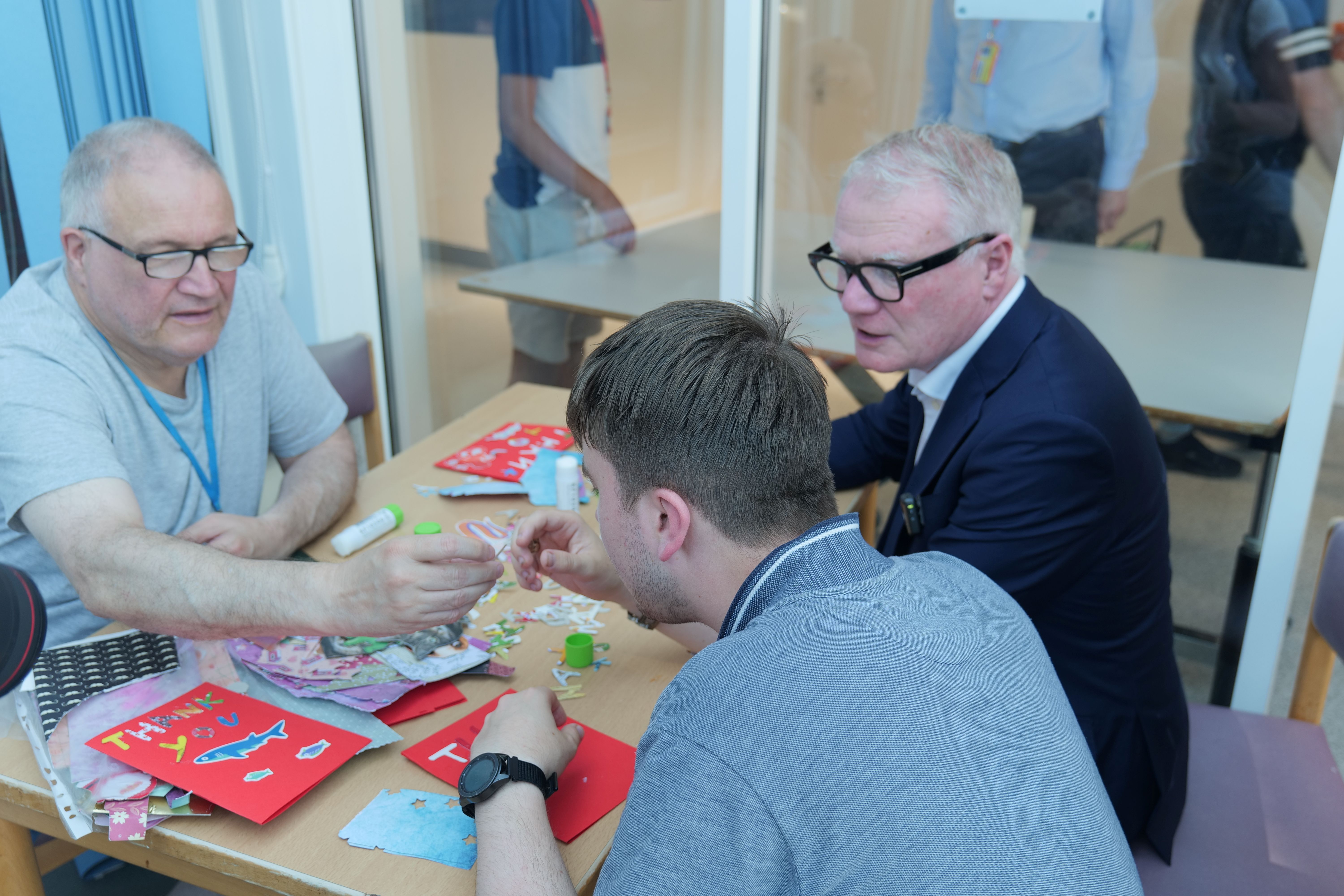 Image of Richard talking to a QAC student