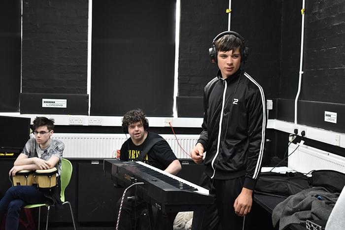 QAC students preparing to record their instrument pieces QAC students preparing to record their instrument pieces