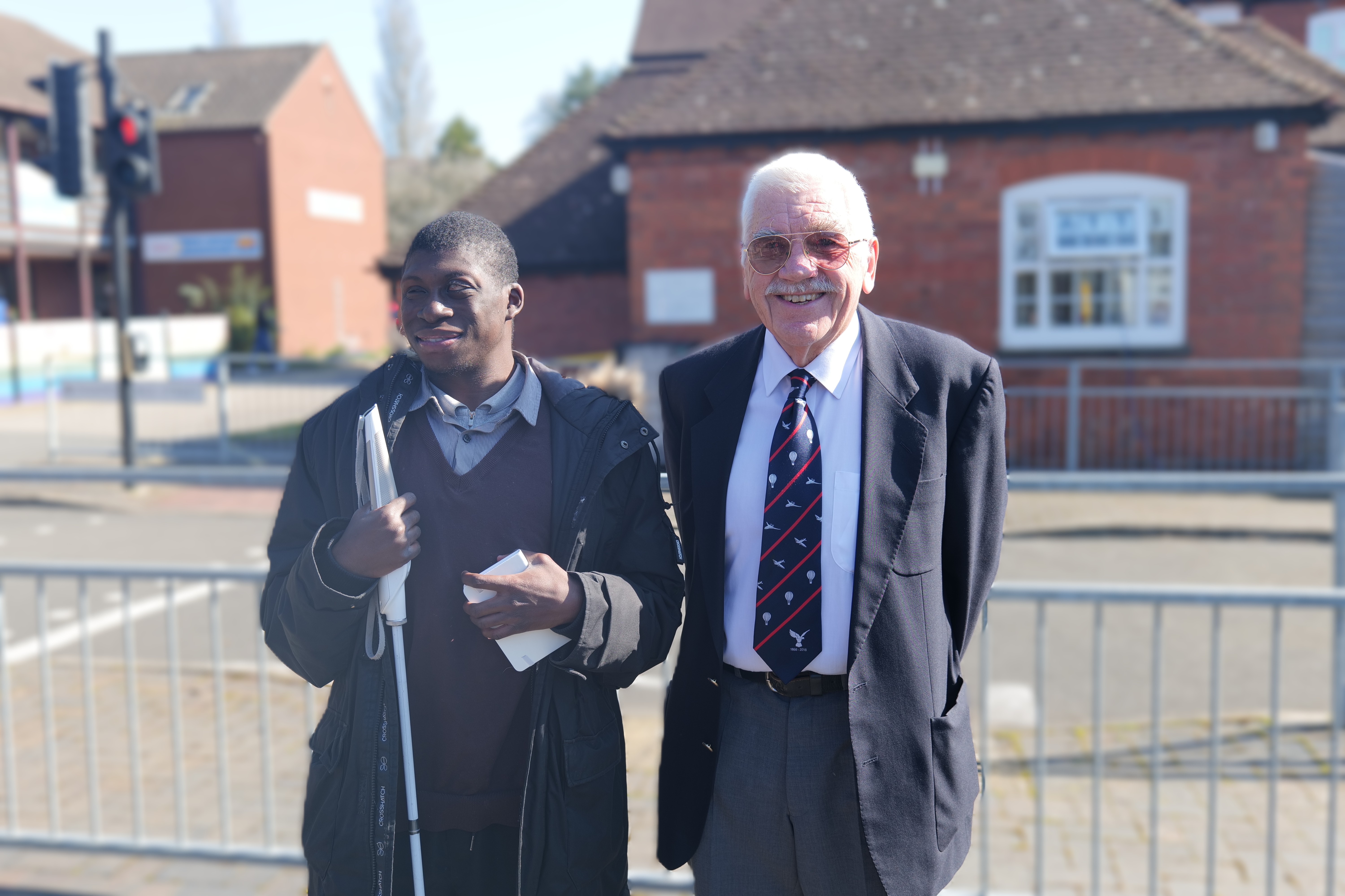 Image of a QA college student with the Falcon 2 staff
