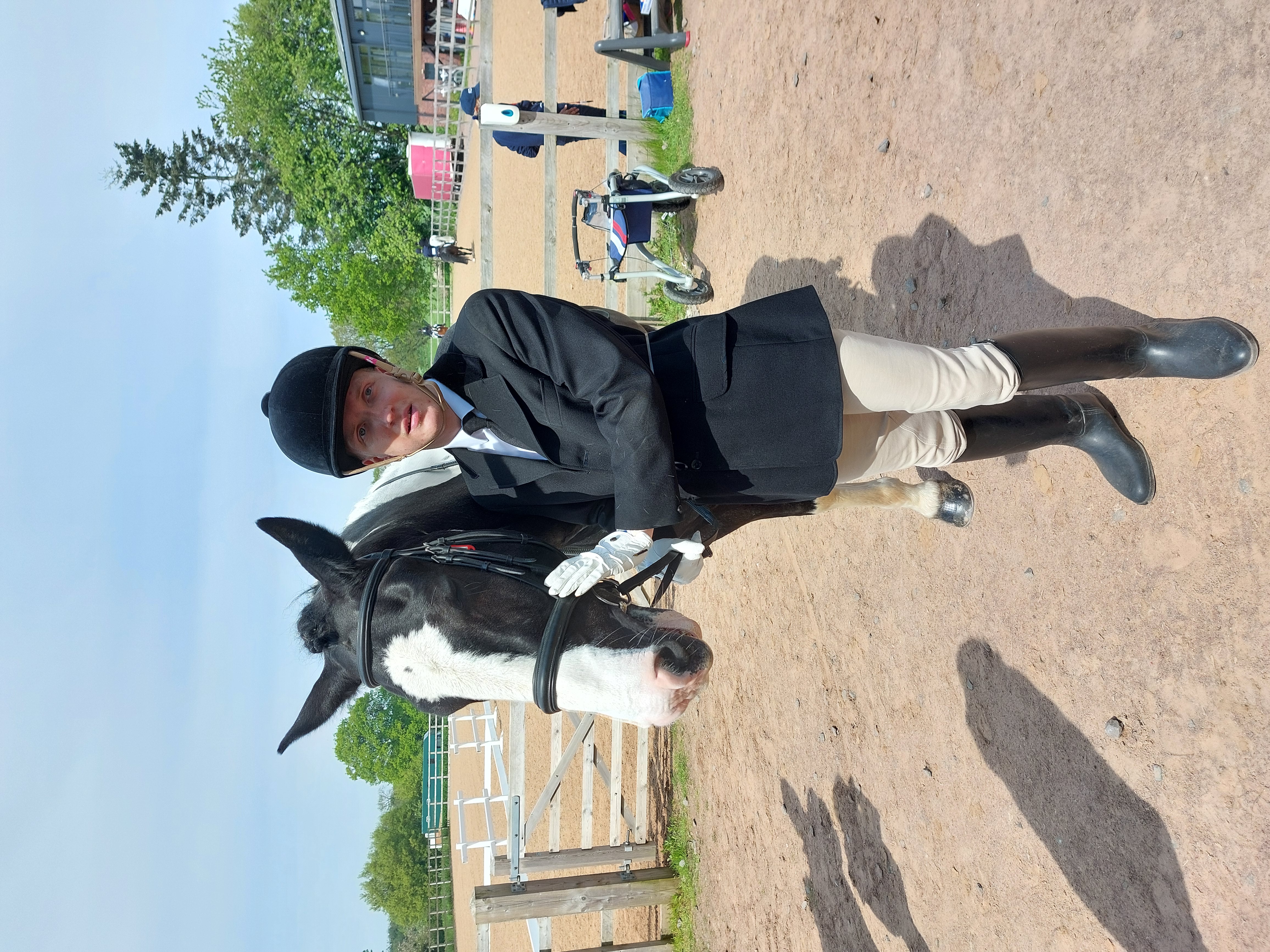 QAC student Sam with his horse, Woody. QAC student Sam with his horse, Woody.