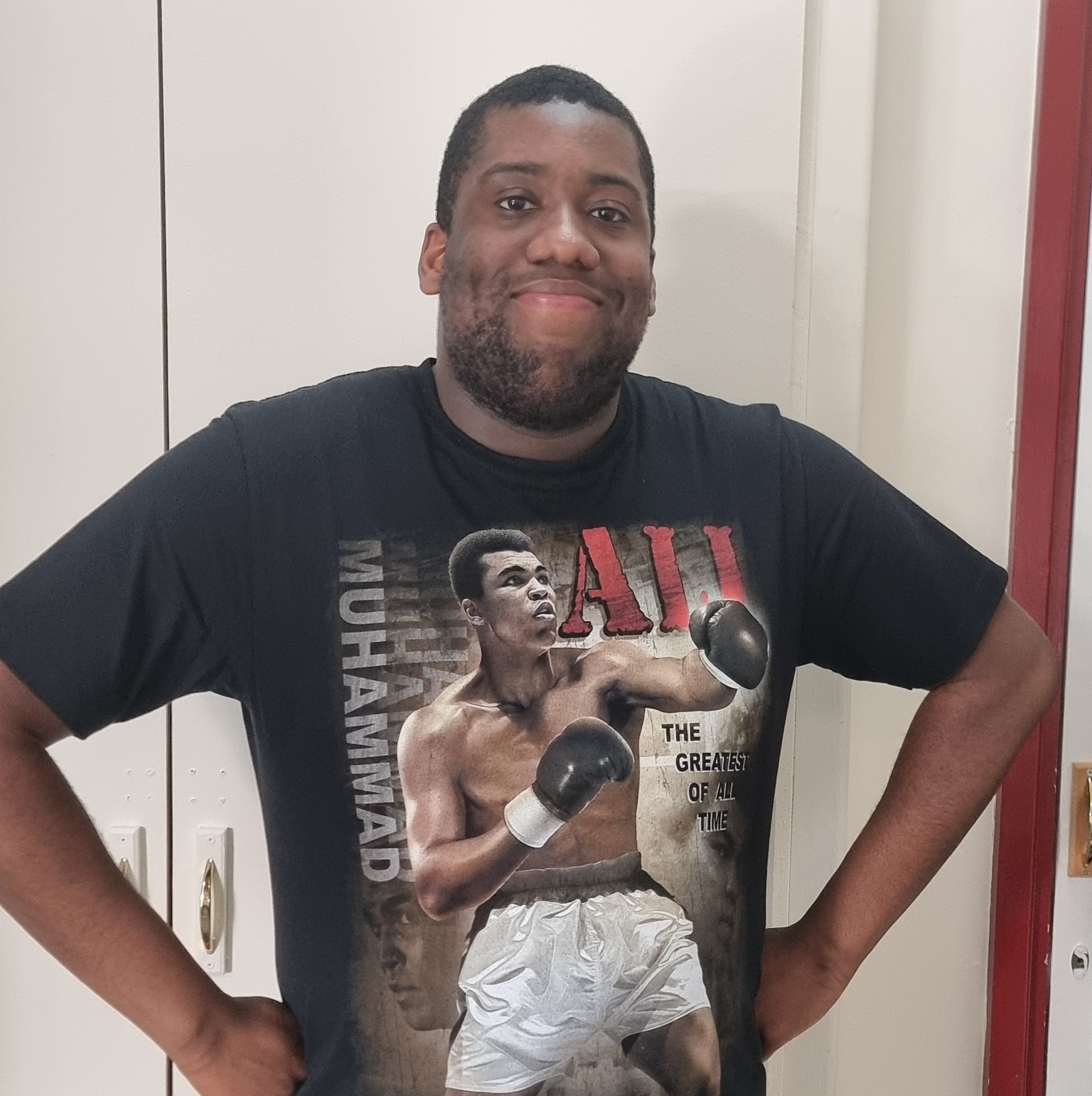 Image of Shakur wearing a black shirt