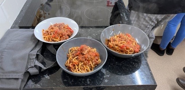 3 completed bowls of Spaghetti Bolognese 3 completed bowls of Spaghetti Bolognese