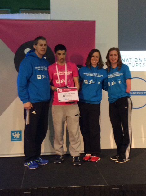 Sanjai being presented with his award