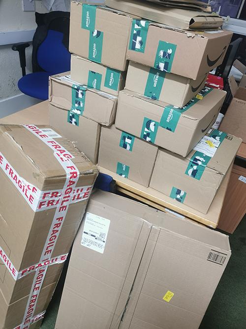 A number of parcels containing items purchased by ZCT for QAC
