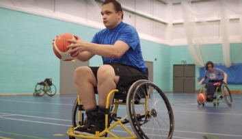 Wheelchair Basketball player holding ball
