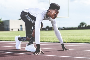 An athlete gets ready to run