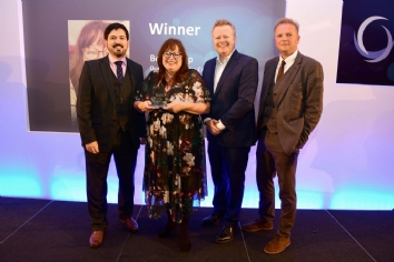 Bev Jessop with her award