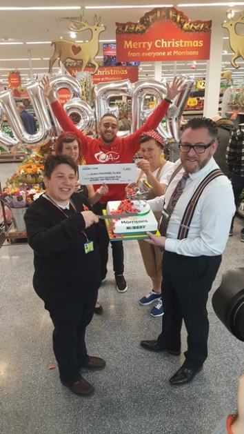 QAC receive cheque from Morrisons